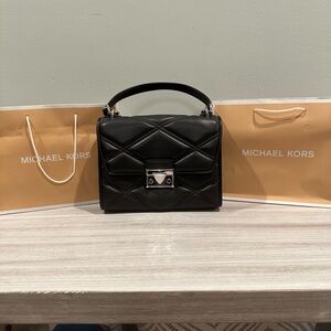 Michael Kors Serena Black Bag with Quilted Texture and Silver Clasp